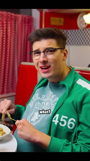 A hungry friend participates in a comical mashup of Squid Game and Fortnite set in the year 2025