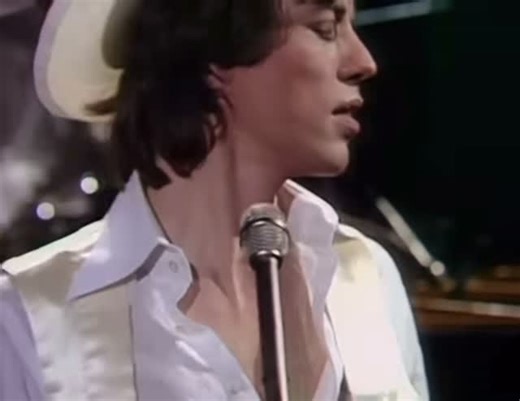 Mick Jagger Archive on Instagram: "“Angie,” released by The Rolling Stones in 1973 as part of their album Goats Head Soup, is a poignant ballad characterized by its acoustic arrangement and introspective lyrics. The song’s melancholic tone, driven by Nicky Hopkins’ piano accompaniment and Mick Jagger’s emotive vocal delivery, reflects themes of heartbreak and longing. Written primarily by Keith Richards, “Angie” is often interpreted as a reflection on personal loss. The track achieved commercial