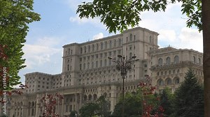 4k video Exterior of Romania’s Palace of Parliament, known as House of the People. Built in Bucharest by dictator Nicolae Ceausescu during the communist Romania
