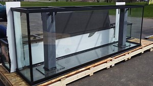Our aquarium frames are so unique that there have been four patents granted in the system. The process for installing a frame is as important as the materials it is made from, therefore we do not sell frames separately from the tanks that we build. | Custom Aquariums