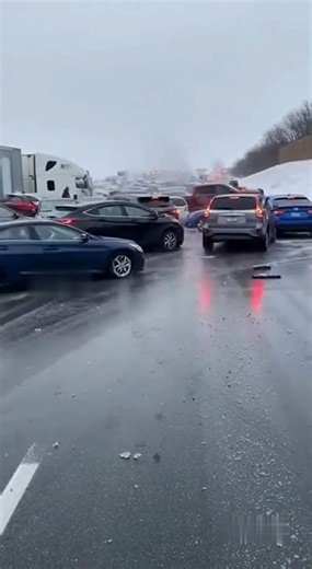A sudden patch of black ice turns a busy interstate into a scene of chaos as over 70 vehicles slide out of control, colliding in a massive chain-reaction pileup. Tires screech, metal crashes, and smoke rises from the wreckage as the camera captures the full intensity of the icy disaster. This hyper-realistic footage highlights the dangers of winter driving, the unpredictability of black ice, and the split-second moments that can lead to catastrophic accidents. This video is created using AI, and