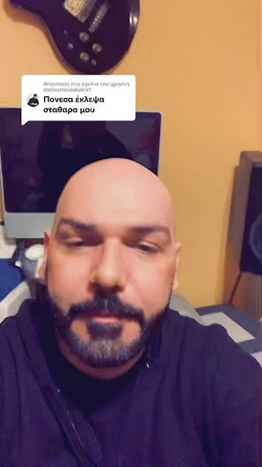 Person in Hoodie at Dual Monitor Setup