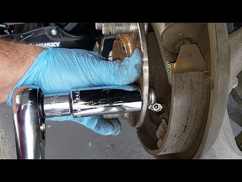How to remove and replace a broken or split bolt or stud on a rear wheel. Wheel studs.