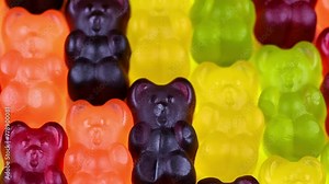 HD Jelly bears or Gummy bears video background. Close up view on bright candy background with jelly candies