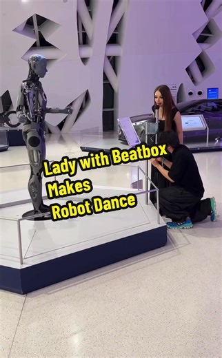 ‏Lady with Beatbox Makes Robot Dance