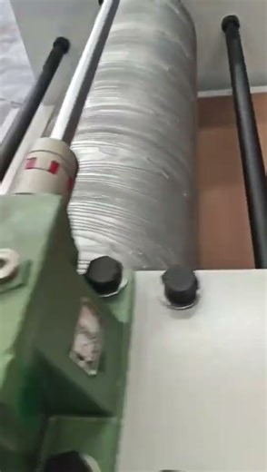 1300 heavy embossing machine presses patterns on MDF board.