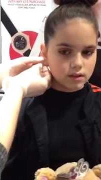 Getting my second ear piercing done at Claire's