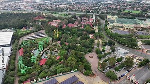 Johannesburg, South Africa, aerial footage, right panning across Gold Reef City complex with Gold Reef City Theme Park, Casino and the famous Apartheid Museum in Johannesburg - 4K video footage