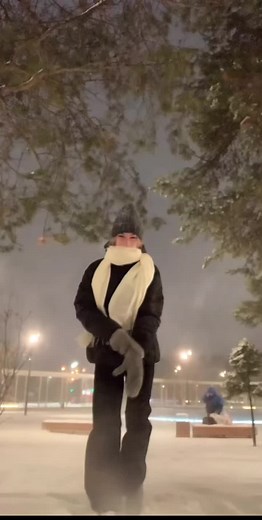 Winter Night Outdoor Dance in Snowy Setting