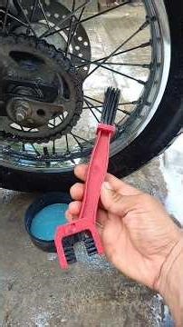 What should I use to clean a chain with a retainer?