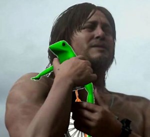 Norman Reedus Holding Things | Know Your Meme