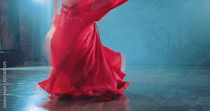 Beautiful swing skirts in dance, oriental style. Belly dance, movement of the hips. Bottom view.
