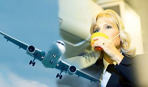 Flight attendant shows the proper way to use an oxygen mask