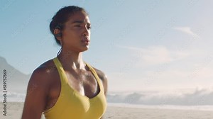 Active, sporty and athletic woman running, training and doing cardio on the beach during summer. Closeup fit, energetic and fast female athlete, doing a workout, exercising and jogging at the sea