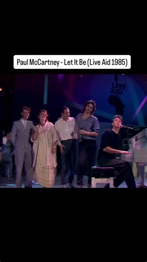 Paul McCartney performing with Alison Moyet, David Bowie, Pete Townshend and Bob Geldof at Live Aid in front of 72,000 people in Wembley Stadium, London on the 13th July, 1985. The event was organised by Sir Bob Geldof and Midge Ure to raise funds for the Ethiopian famine disaster. Broadcast across the world via one of the largest satellite link-ups of all time, the concerts were seen by around 40% of the global population. Follow @best.liveperformance for more #liveaid #letitbe #liveperformance