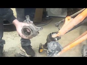 Inspecting, and changing, the Front Wheel Bearings on a Polaris RZR.