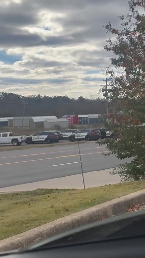 Heavy police presence is currently on Airport Road at an abandoned building across from Circle K. Around a dozen officers were seen with guns drawn. | Hot Springs Daily News