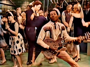 Chuck Berry - Johnny B. Goode (1958) Chuck Berry's "Johnny B. Goode," released in 1958, is a legendary rock 'n' roll anthem that became one of the era's most influential songs. Telling the story of Johnny, a Louisiana country boy with dreams of fame through his guitar skills, the song captures youthful ambition and the American dream. Berry's energetic performance and signature guitar riffs made it an instant classic, influencing countless artists across genres. Partly reflecting Berry's life an