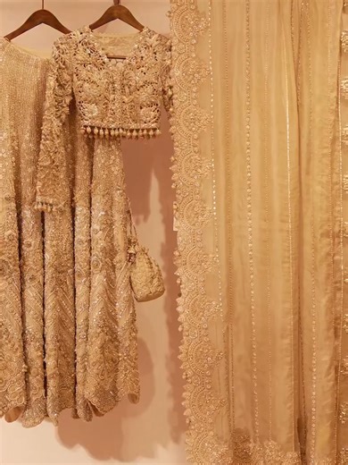 AZUREH - A timeless ivory couture sculpted with 3D florets, pearls & beads. The intricate play of dabka, nakshi, and diamanté embroidery evokes timeless artistry, making it a masterpiece for the bride who dreams in elegance, yet moves through modernity with grace. Available In Bridal Studios & Online 📍: R-4, MM ALAM ROAD, BLOCK T, GULBERG 2, Lahore 📍 Plot No. F-40A, E-Street, Block 4, Clifton, Karachi #mariabbrides #mariabofficial #bridesbymariab