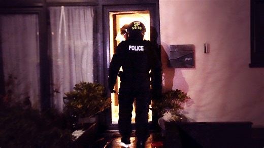 Moment police force entry to house in drugs raid