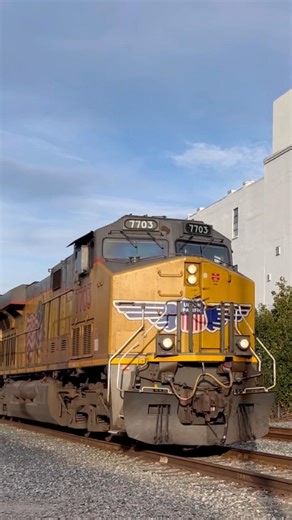 Union Pacific freight train with a AC6000CW in trail