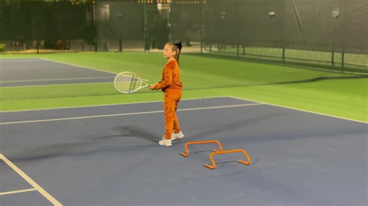 Sawyer is working the leisure suit out here at a chilly tennis practice. | Matt Austin