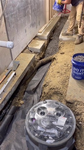 How to install a sump pump basin in a high water table basement. #construction #tools | Alexander John