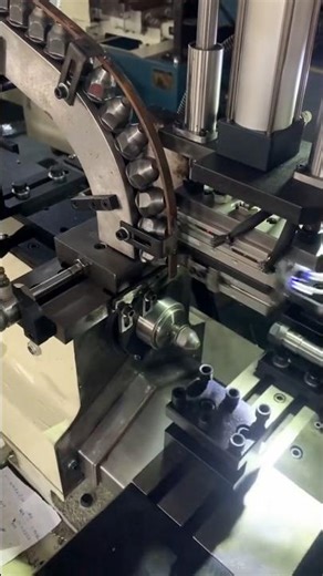 Robotic arms for automatic loading and unloading, automated CNC lathe machining #automation
