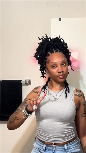 Liyah w/ Da Locs 🍄 on Instagram: "The girlies were asking if the braids over locs style is heavy or does it mess up your locs.. 1. It is not heavy when you first get it, after a while it does get a little annoying but it’s not bad. I was getting braids all the time before I loc’d my hair so it’s no different for me fr 2. I used Cuban twist hair I believe, I don’t remember how many packs 3. I promise it’s not that tight, I’m just very tender headed. Parting my hair even hurts 😂"