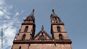Basel Minster Cathedral Exterior Views. Basler Münster (Basel Minster) Cathedral in Basel, Switzerland. Beautiful exterior views of the twin peaks in this most popular landmark in the city.