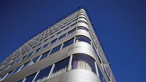 Park Road Apartments is a radical housing tower clad in "ridiculous" metal