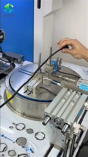 Automatic cable reeling and tying machine
