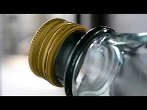 Capping machine for aluminum screw caps