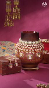 Brides of India Wedding Diaries ​ Bridal Trousseau ft. Punjabi Bride ​ A tiered floral choker adorned with Polki clusters and bold centre drops, lifted with green tones and pink highlights, giving the piece a lively, festive bridal character. The layered design celebrates tradition while adding a modern touch of elegance. ​ Hanging Polki earrings feature luminous mint-green centre stones set in an antique-inspired frame, echoing the necklace’s detailing. ​ The elongated silhouette adds graceful 