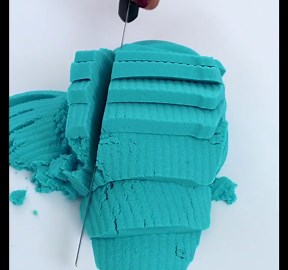 Satisfying Knife Cutting Blue Sand