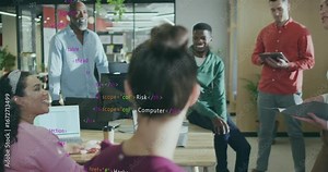 Presenter gesturing toward team in office showing security risks with animated code around tablet