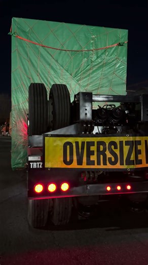 Oversize transportation in the USA. Securing with straps. Overnight parking with an oversize load.