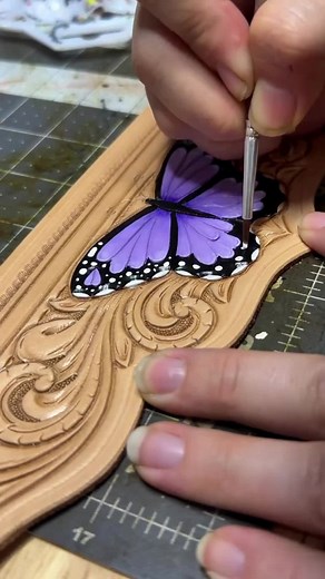 Angelus Direct | Paints, Dyes, Cleaners for Shoes & More on Instagram: "The possibilities are endless with Angelus Leather Paints. Watch as @braidedrootscraftco paints a piece of tooled leather and then sews it onto their custom bottle holder 🎨 Would you try this DIY project out? #angelusdirect #angeluspaint #leatherwork #artsandcrafts #tooledleather"