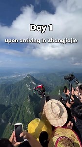 🌿 5 Days in Zhangjiajie: A Journey Through Nature’s Masterpiece! 🏔️ If you’re craving an adventure that blends breathtaking landscapes, rich culture, and thrilling experiences, Zhangjiajie is calling your name! Here’s how you can spend an unforgettable 5 days in this magical destination: ✨ Day 1: Step Into Tradition 🏮 Arrive in Zhangjiajie and explore the 72-layered arcade buildings—a glimpse into ancient architecture. 🔥 Experience the warmth of a bonfire party and immerse yourself in local 