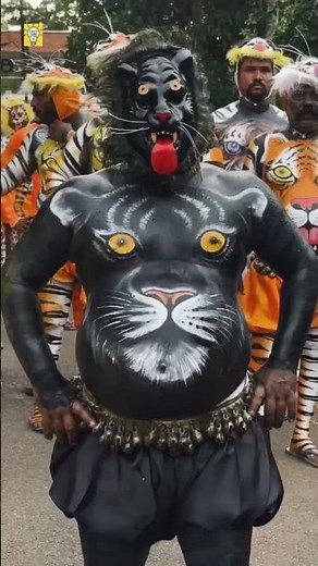 From a Distance It’s a Tiger… Up Close It’s Human! 🐯😳