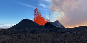 Hawaii's Mauna Loa volcano spews 'lava fountain' of liquid rock into air as lava flows slow