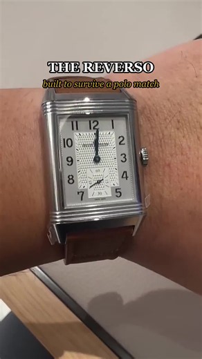 The Reverso was built to survive a polo match. Back in 1931 British officers in India kept cracking their watch crystals mid game, so Jaeger LeCoultre made a case that flips. One slide and the dial spins face down, showing solid steel to the world while the glass hides safe underneath. Those clean rectangular lines are pure Art Deco, and they got it so right they basically never changed it. Flip the watch over and the back is a blank canvas. People engrave it, paint it, turn it into the most per