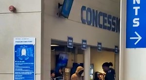 VIDEO: College Football Team's Fans Are Outraged After Cameras Spotted One Of Their Players At The Concession Stand In The Middle Of Rivalry Game