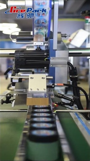 Round Can Top Labeling Machine for Lid and Flat Surface Sticker Labels | Grepack