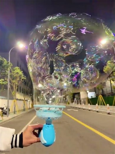 Who can refuse a bubble machine that spits out bubbles within bubbles? The bubble machine makes
