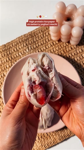 Sabrina | Melbourne food & lifestyle 🤍 on Instagram: "4 ingredient high protein rice paper strawberry yoghurt mochi 🍦🍓✨☁️ aka the easiest healthy summer freezer treat you’ll be making on repeat 🍦 165 calories • 20g protein per piece Ingredients: • 1 cup high protein, low fat greek yoghurt • 1 serve vanilla or strawberry protein (or sub for sugar free / natural sweetener) (I used @nakedharvestsupplements discount code: ‘SABRINANH’ for 15% off 💌) • 1 cup chopped strawberries (I used frozen) •