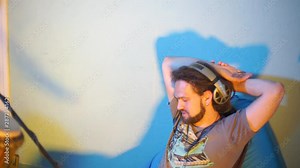 music teacher tells students how to play musical instruments