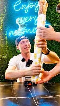 I'm ordering and trying to get the biggest shawarma kebab wrap in Austria! 🇦🇹