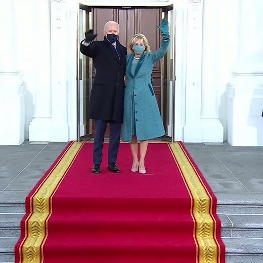 President Biden enters the White House with his family