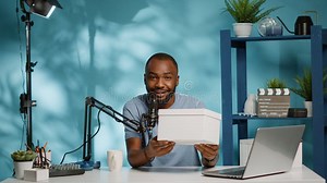 African American Influencer Holding Present Box Camera Stock Photos - Free & Royalty-Free Stock Photos from Dreamstime